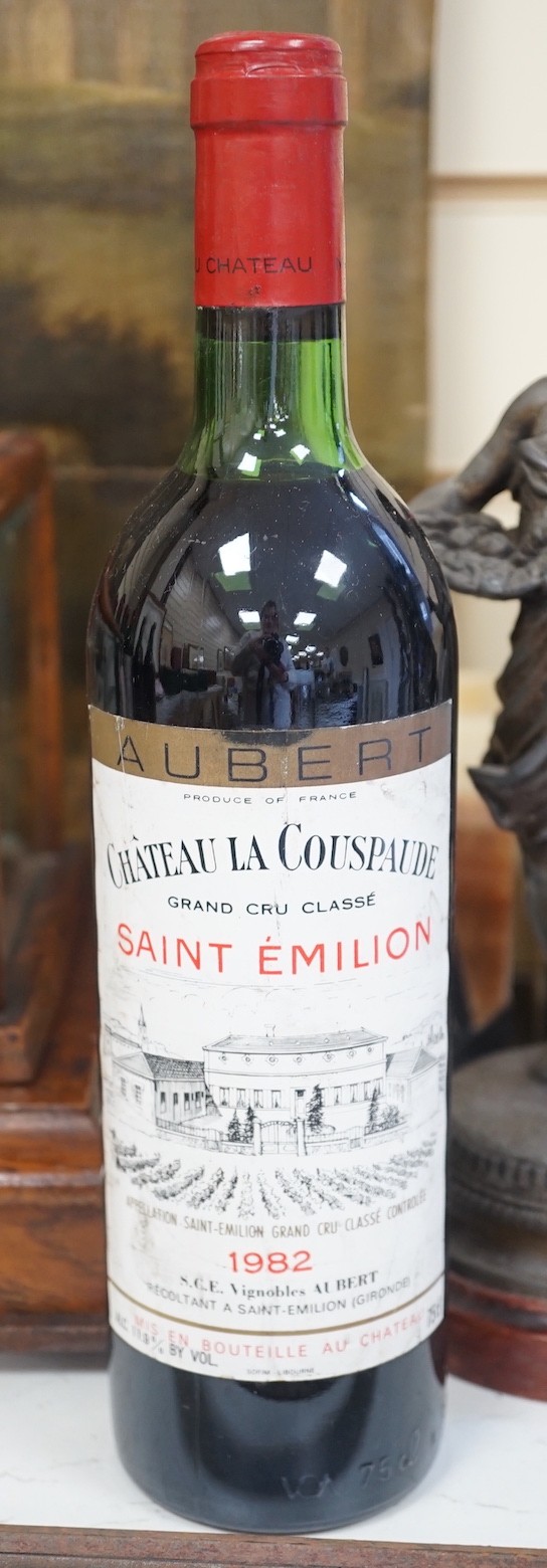 Eight bottles of Chateau Haut-Bages Monpelou 1983, a bottle of Chateau La Couspaude Saint Emilion 1982 and 3 bottles of Couvent des Jacobins Saint Emilion Grand Cru Classe 1982